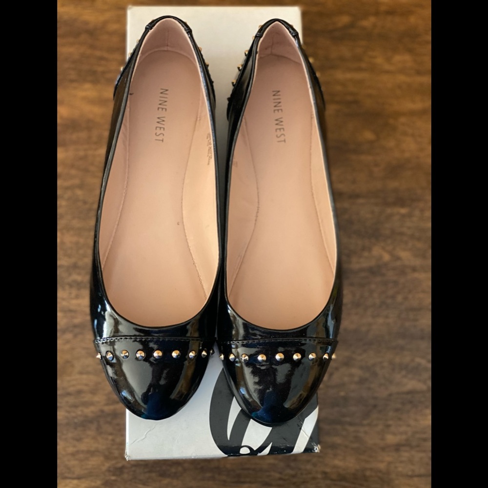 Nine West, black patent leather shoe with gold studs, size 7.5, gently worn.